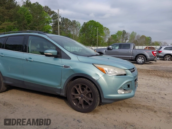 2013 Ford Escape SEL with VIN 1FMCU0HX1DUD56986, listed as a IAAI auction lot 42026927 with 180,318 mi miles. Bid and sale history available at carsss.com. Image 6.