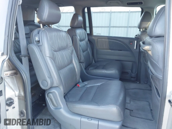 2006 Honda Odyssey Touring z VIN 5FNRL38856B098897, wystawiony jako IAAI lot #41251740 z przebiegiem 258 408 mil mil oraz . Historia ofert i sprzedaży dostępna na DreamBid. Obrazek 8.