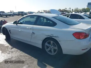 2015 BMW 4 Series 428i with VIN WBA3N7C54FK225367, listed as a IAAI auction lot 41958685 with 142,104 mi miles. Bid and sale history available at carsss.com. Image 14.