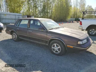 1987 Oldsmobile Cutlass Ciera with VIN 2G3AM51RXH9391582, listed as a Copart auction lot 53736795 with 81,728 mi miles and Clean Title. Bid and sale history available at DreamBid. Image 4.