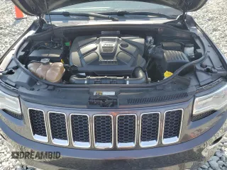 2015 Jeep Grand Cherokee Overland with VIN 1C4RJFCMXFC237723, listed as a Copart auction lot 50318145 with 103,741 mi miles and Salvage title. Bid and sale history available at DreamBid. Image 12.