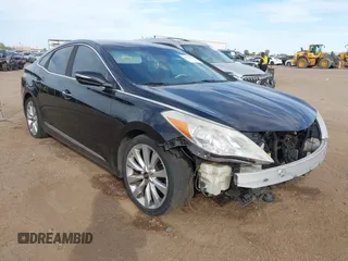 2013 Hyundai Azera z VIN KMHFH4JG8DA329143, wystawiony jako IAAI lot #41933036 z przebiegiem Nie podano mil oraz . Historia ofert i sprzedaży dostępna na DreamBid. Obrazek 1.