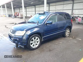 2010 Suzuki Grand Vitara Limited z VIN JS3TE1D9XA4100034, wystawiony jako IAAI lot #42466762 z przebiegiem 189 428 mil mil oraz . Historia ofert i sprzedaży dostępna na DreamBid. Obrazek 2.