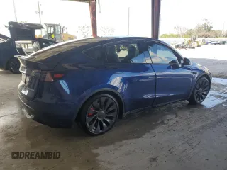 2023 Tesla Model Y Performance with VIN 7SAYGDEF1PF865688, listed as a Copart auction lot 44924385 with 19,255 mi miles and Non Repairable. Bid and sale history available at DreamBid. Image 3.