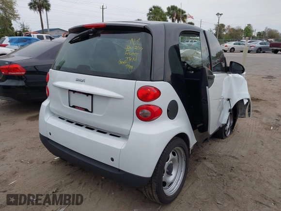 2009 Smart fortwo Pure z VIN WMEEJ31X39K314325, wystawiony jako IAAI lot #41607981 z przebiegiem 59 684 mil mil oraz . Historia ofert i sprzedaży dostępna na DreamBid. Obrazek 16.