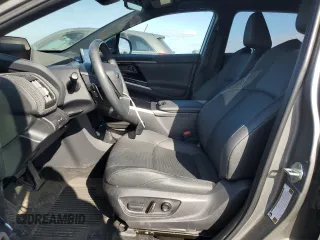 2024 Subaru Solterra Limited с VIN JTMABABA8RA049528, выставлен на аукционе Copart как лот 50563845 с пробегом 13 114 миль миль и Списание • Salvage title. История ставок и продаж доступна на DreamBid. Изображение 7.