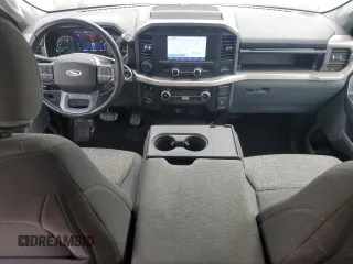 2021 Ford F-150 XL with VIN 1FTFX1E82MKE64671, listed as a Copart auction lot 51819705 with 34,913 mi miles and Salvage title. Bid and sale history available at DreamBid. Image 8.