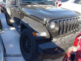 2018 Jeep Wrangler Unlimited Sport z VIN 1C4HJXDN9JW231587, wystawiony jako IAAI lot #41564880 z przebiegiem 129 003 mil mil oraz . Historia ofert i sprzedaży dostępna na DreamBid. Obrazek 1.