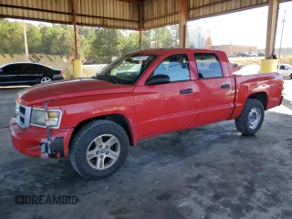 2010 Dodge Dakota Bighorn/Lonestar z VIN 1D7CE3GK9AS163619, wystawiony jako Copart lot #77604814 z przebiegiem 187 461 mil mil oraz Czysty tytuł • Clean title. Historia ofert i sprzedaży dostępna na DreamBid. Obrazek 1.