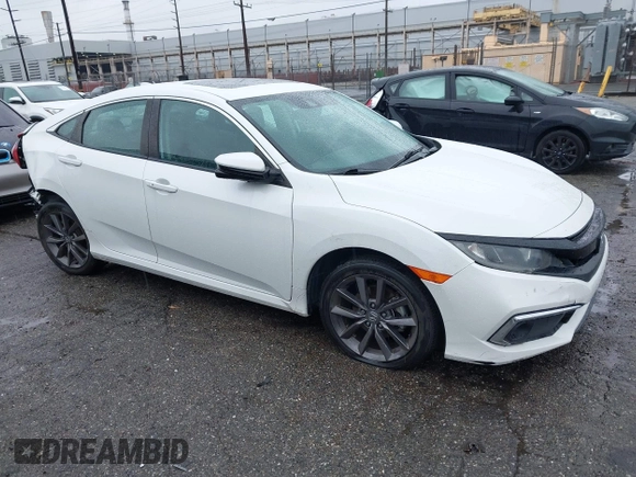 2021 Honda Civic Sedan EX-L with VIN 19XFC1F77ME205128, listed as a IAAI auction lot 41562202 with 82,257 mi miles. Bid and sale history available at carsss.com. Image 1.
