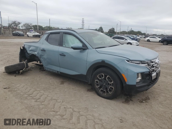 2023 Hyundai Santa Cruz SEL z VIN 5NTJC4AE4PH043025, wystawiony jako Copart lot #41617645 z przebiegiem Nie podano mil oraz Nie do naprawy • Non repairable. Historia ofert i sprzedaży dostępna na DreamBid. Obrazek 4.