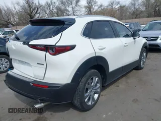 2023 Mazda CX-30 S Carbon Edition with VIN 3MVDMBCM8PM560726, listed as a IAAI auction lot 41949740 with 35,164 mi miles and . Bid and sale history available at carsss.com. Image 4.
