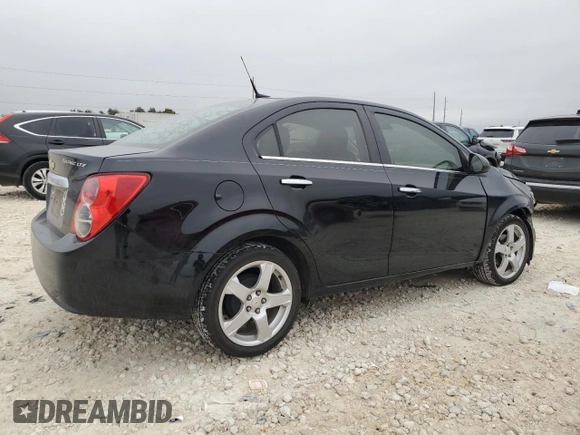2012 Chevrolet Sonic LTZ z VIN 1G1JE5SB2C4173638, wystawiony jako Copart lot #84634474 z przebiegiem 148 247 mil mil oraz Szkoda całkowita • Salvage title. Historia ofert i sprzedaży dostępna na DreamBid. Obrazek 3.