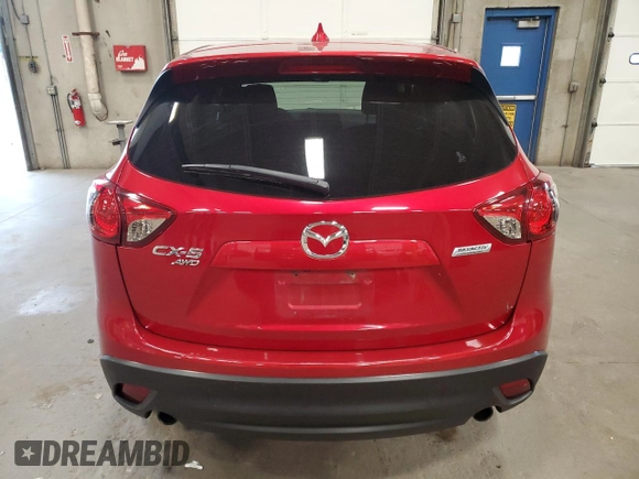 2016 Mazda CX-5 Touring z VIN JM3KE4CY7G0898598, wystawiony jako Copart lot #56717895 z przebiegiem 103 548 mil mil oraz Szkoda całkowita • Salvage title. Historia ofert i sprzedaży dostępna na DreamBid. Obrazek 6.