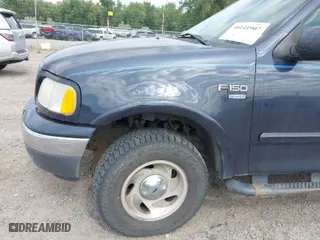 2000 Ford F-150 XL with VIN 1FTRX18L6YNB68229, listed as a IAAI auction lot 40141907 with 1 mi miles. Bid and sale history available at carsss.com. Image 13.