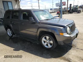 2014 Jeep Patriot Latitude with VIN 1C4NJPFB9ED822901, listed as a Copart auction lot 51005655 with 130,149 mi miles and Salvage Title. Bid and sale history available at carsss.com. Image 4.