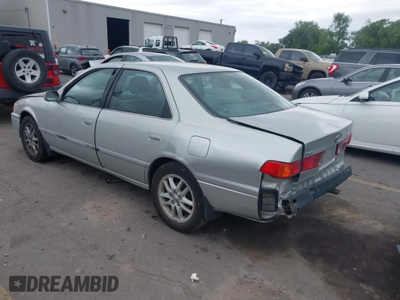 2001 Toyota Camry LE z VIN 4T1BF28K71U127407, wystawiony jako IAAI lot #42247606 z przebiegiem 289 995 mil mil oraz . Historia ofert i sprzedaży dostępna na DreamBid. Obrazek 3.