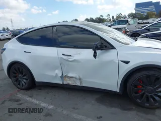 2022 Tesla Model Y Performance with VIN 7SAYGDEF1NF559572, listed as a IAAI auction lot 41516070 with 43,240 mi miles and . Bid and sale history available at DreamBid. Image 12.