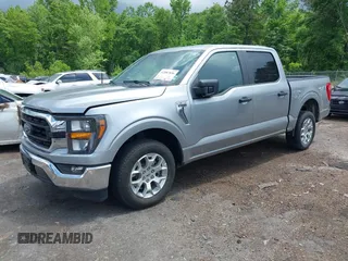 2023 Ford F-150 XL with VIN 1FTEW1C84PKD69454, listed as a IAAI auction lot 42087856 with 53,164 mi miles. Bid and sale history available at carsss.com. Image 2.