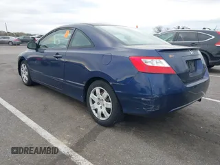 2008 Honda Civic Cpe LX with VIN 2HGFG12608H530474, listed as a IAAI auction lot 42084035 with 182,037 mi miles. Bid and sale history available at carsss.com. Image 3.