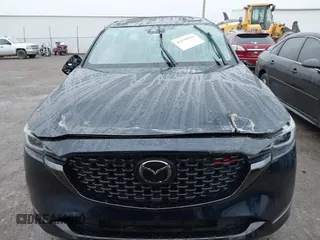 2022 Mazda CX-5 2.5 Turbo with VIN JM3KFBAY8N0635618, listed as a IAAI auction lot 41199038 with Not Provided miles and . Bid and sale history available at carsss.com. Image 12.