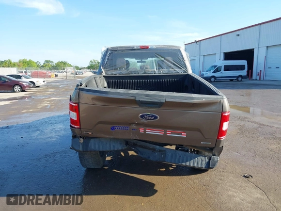 2018 Ford F-150 XL with VIN 1FTEW1EG1JFC31794, listed as a IAAI auction lot 41304111 with 129,058 mi miles and . Bid and sale history available at carsss.com. Image 16.
