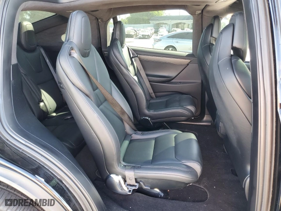 2019 Tesla Model X P100D with VIN 5YJXCBE46KF185298, listed as a Copart auction lot 74799084 with NaN miles and Salvage Title. Bid and sale history available at carsss.com. Image 11.