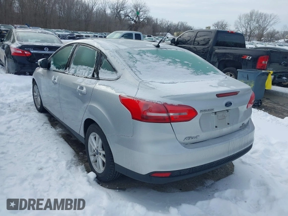2015 Ford Focus SE z VIN 1FADP3F26FL357140, wystawiony jako IAAI lot #41256854 z przebiegiem 194 812 mil mil oraz . Historia ofert i sprzedaży dostępna na DreamBid. Obrazek 3.