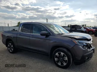 2020 Honda Ridgeline RTL with VIN 5FPYK3F5XLB017323, listed as a Copart auction lot 58368395 with 117,058 mi miles and Salvage title. Bid and sale history available at DreamBid. Image 4.