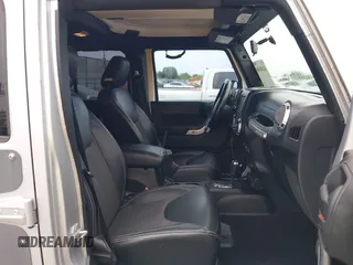 2012 Jeep Wrangler Unlimited Call of Duty MW3 with VIN 1C4BJWFG7CL281844, listed as a IAAI auction lot 42494946 with 93,669 mi miles and . Bid and sale history available at DreamBid. Image 5.