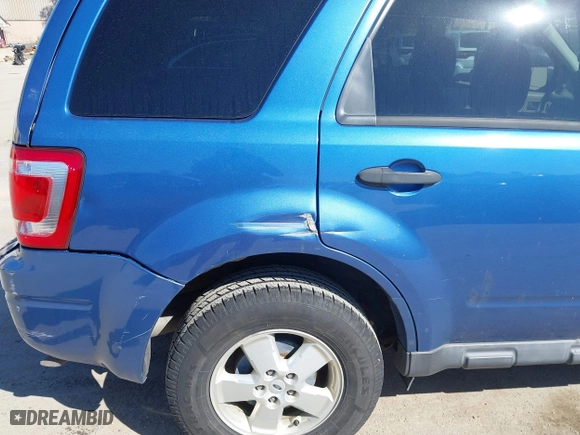 2010 Ford Escape XLT with VIN 1FMCU0D79AKB07543, listed as a IAAI auction lot 41846743 with 165,883 mi miles. Bid and sale history available at carsss.com. Image 6.