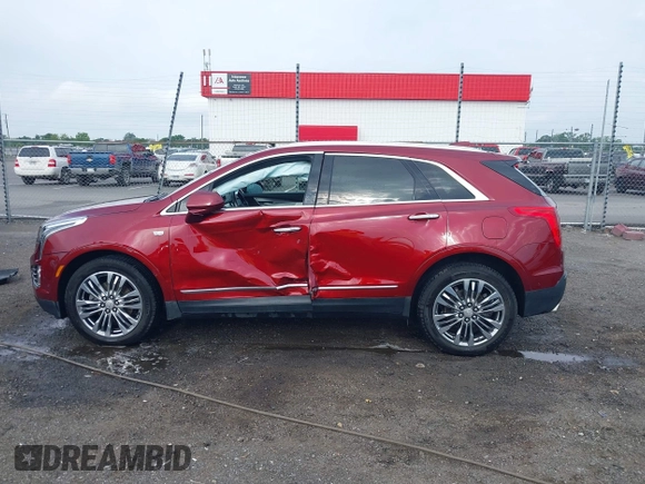 2018 Cadillac XT5 Premium Luxury FWD z VIN 1GYKNERS2JZ242842, wystawiony jako IAAI lot #42297159 z przebiegiem 72 008 mil mil oraz . Historia ofert i sprzedaży dostępna na DreamBid. Obrazek 14.