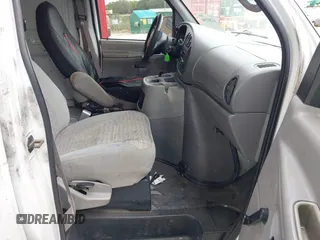 2001 Ford Econoline Cargo with VIN 1FTRE14261HA22632, listed as a IAAI auction lot 41202164 with 153,412 mi miles and . Bid and sale history available at DreamBid. Image 5.