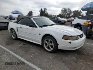 2004 Ford Mustang Deluxe z VIN 1FAFP44454F123067, wystawiony jako Copart lot #86784474 z przebiegiem 161 541 mil mil oraz Szkoda całkowita • Salvage title. Historia ofert i sprzedaży dostępna na DreamBid. Obrazek 4.