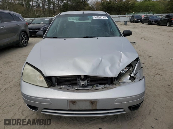 2006 Ford Focus S with VIN 1FAHP34N56W109006, listed as a Copart auction lot 53987745 with 111,677 mi miles and Salvage Title. Bid and sale history available at carsss.com. Image 5.