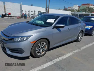 2017 Honda Civic LX z VIN 2HGFC2F5XHH572573, wystawiony jako IAAI lot #41825261 z przebiegiem 83 599 mil mil oraz . Historia ofert i sprzedaży dostępna na DreamBid. Obrazek 17.