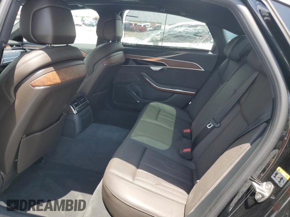 2019 Audi A8 with VIN WAU8DAF89KN011642, listed as a Copart auction lot 57915325 with 27,018 mi miles and Salvage title. Bid and sale history available at DreamBid. Image 10.