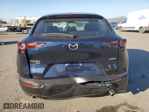 2025 Mazda CX-30 S with VIN 3MVDMBAM5SM751984, listed as a Copart auction lot 43232255 with 2,448 mi miles and Salvage title. Bid and sale history available at DreamBid. Image 6.