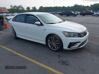 2018 Volkswagen Passat S z VIN 1VWAA7A39JC016259, wystawiony jako IAAI lot #42382550 z przebiegiem 89 143 mil mil oraz . Historia ofert i sprzedaży dostępna na DreamBid. Obrazek 1.
