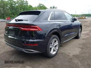 2019 Audi Q8 Premium z VIN WA1AVAF16KD019301, wystawiony jako IAAI lot #42227309 z przebiegiem 84 431 mil mil oraz . Historia ofert i sprzedaży dostępna na DreamBid. Obrazek 4.