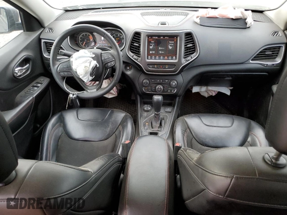 2021 Jeep Cherokee Trailhawk with VIN 1C4PJMBX7MD215581, listed as a Copart auction lot 51281205 with 62,199 mi miles and Salvage title. Bid and sale history available at DreamBid. Image 8.
