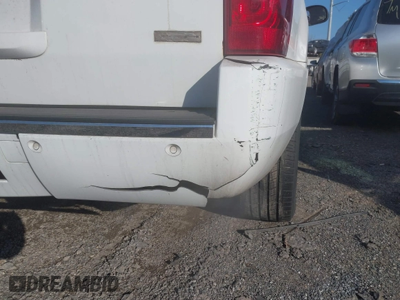 2010 Chevrolet Tahoe LTZ with VIN 1GNUKCE01AR197786, listed as a IAAI auction lot 41659828 with 288,151 mi miles and . Bid and sale history available at DreamBid. Image 6.