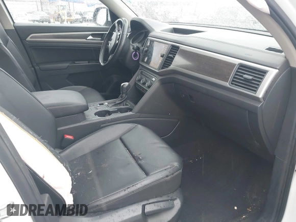2019 Volkswagen Atlas SE z VIN 1V2WR2CA8KC504134, wystawiony jako IAAI lot #41700050 z przebiegiem 97 047 mil mil oraz . Historia ofert i sprzedaży dostępna na DreamBid. Obrazek 5.