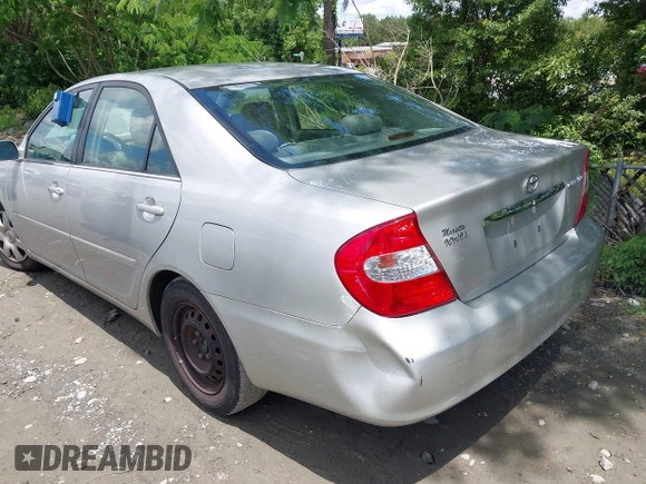 2003 Toyota Camry LE with VIN 4T1BE32K73U157902, listed as a IAAI auction lot 42248544 with 106,675 mi miles and . Bid and sale history available at DreamBid. Image 3.