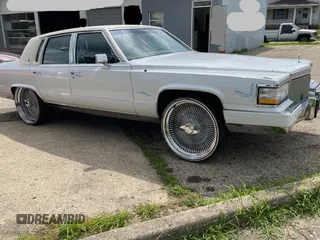 1991 Cadillac Brougham с VIN 1G6DW54E4MR712485, выставлен на аукционе Copart как лот 66643735 с пробегом 121 268 миль миль и Чистый • Clean title. История ставок и продаж доступна на DreamBid. Изображение 1.