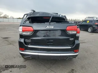 2015 Jeep Grand Cherokee Summit with VIN 1C4RJFJG2FC913658, listed as a Copart auction lot 52160035 with 138,008 mi miles and Salvage Title. Bid and sale history available at DreamBid. Image 6.