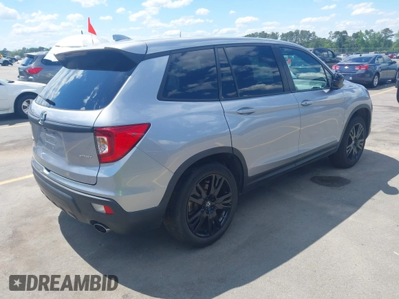 2021 Honda Passport Sport with VIN 5FNYF7H27MB003467, listed as a IAAI auction lot 42183219 with 52,156 mi miles and . Bid and sale history available at DreamBid. Image 4.