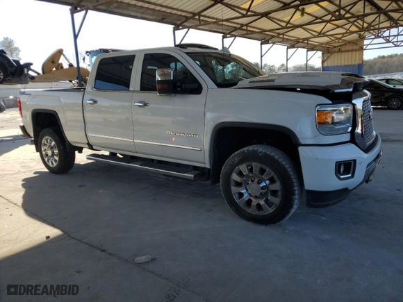 2017 GMC Sierra 2500HD Denali with VIN 1GT12UEY6HF249951, listed as a Copart auction lot 41397235 with 99,713 mi miles and Salvage Title. Bid and sale history available at carsss.com. Image 4.