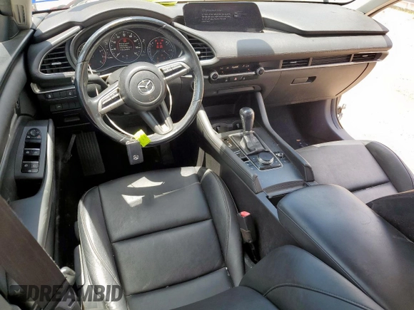 2021 Mazda 3 Select with VIN JM1BPABLXM1323957, listed as a Copart auction lot 62337215 with 75,068 mi miles and Salvage title. Bid and sale history available at DreamBid. Image 8.
