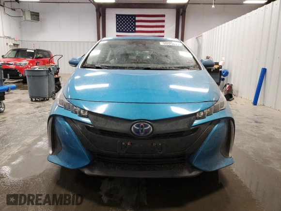 2021 Toyota Prius LE with VIN JTDKAMFP7M3186254, listed as a Copart auction lot 50225635 with 69,882 mi miles and Salvage Title. Bid and sale history available at DreamBid. Image 5.